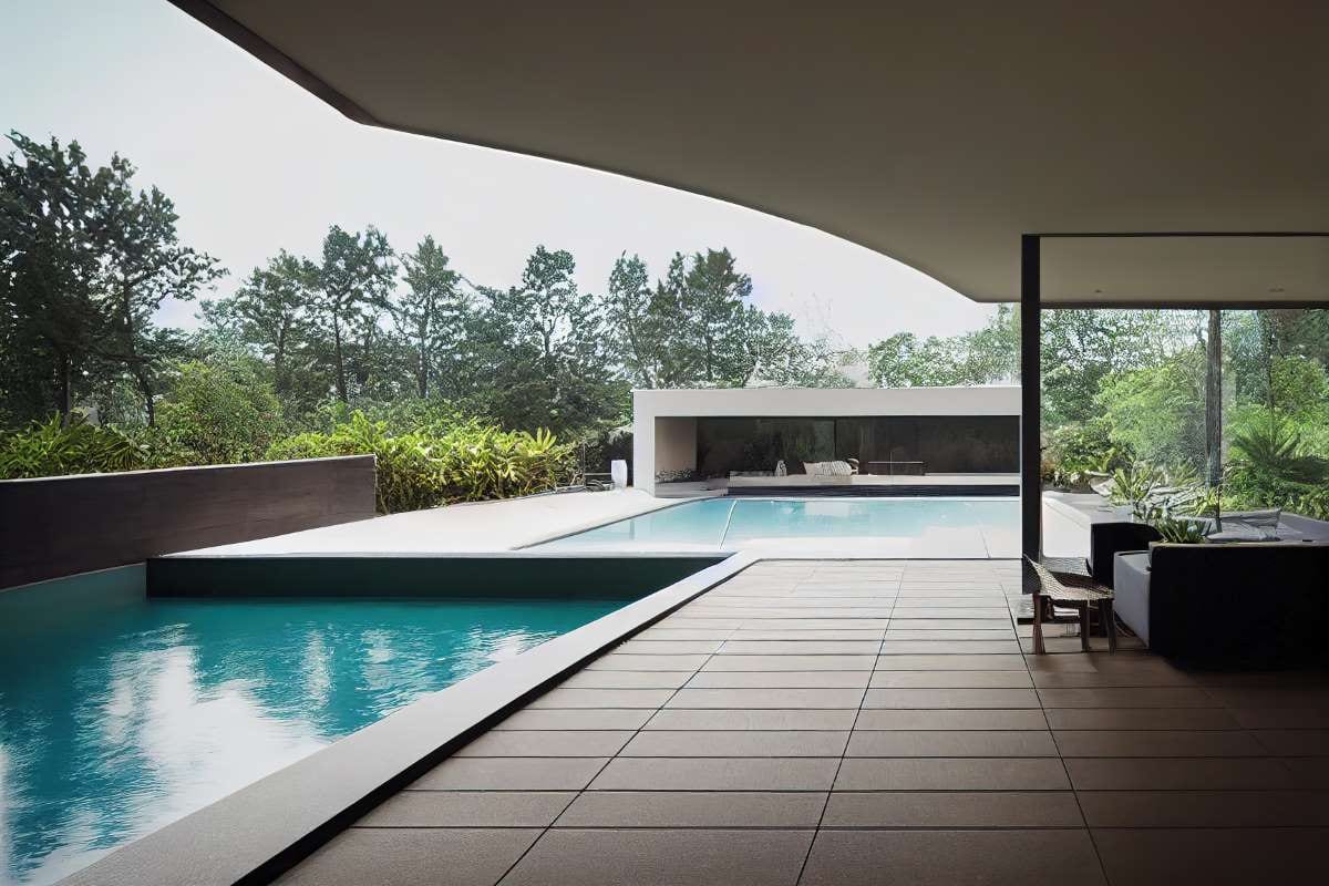 Large outdoor pool with trees in the background