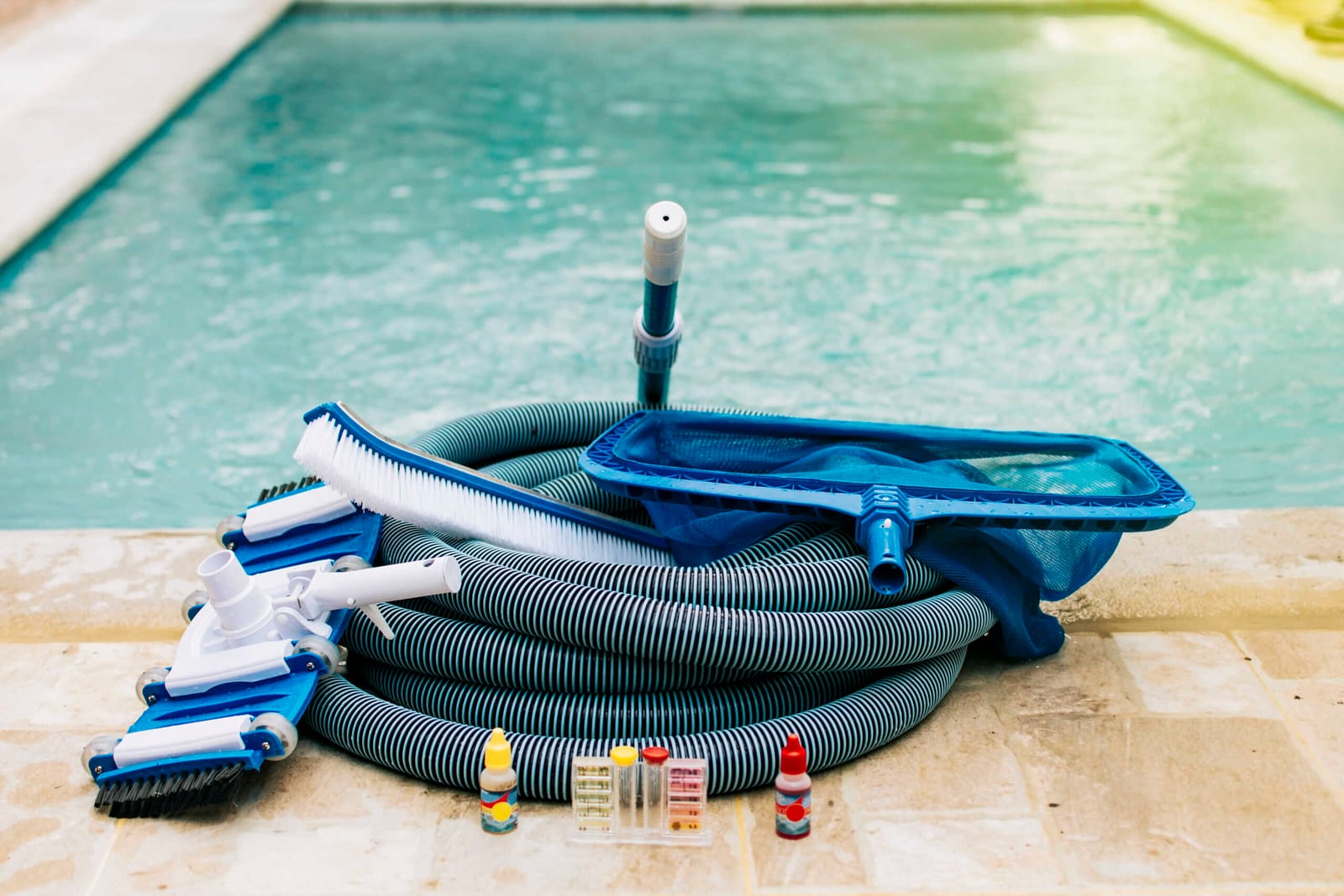 Pool cleaning maintenance kit with vacuum, pH test and leaf picker tools