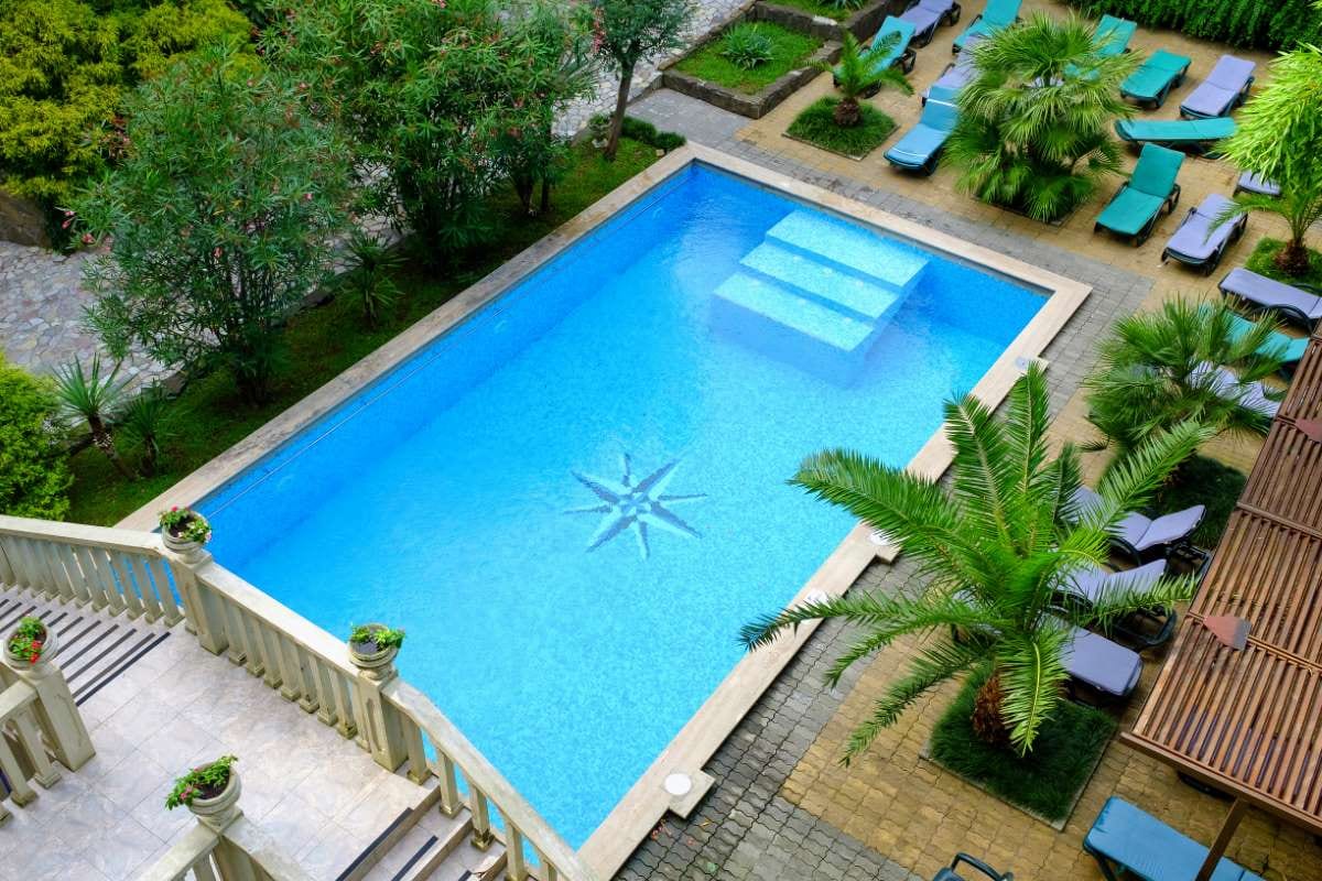 Blue swimming pool water surface background