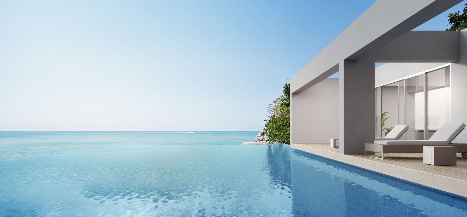 Modern beach house terrace beside a living room and swimming pool